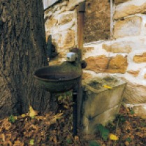 Old fountain by the barn. Photo by Jason Swartz